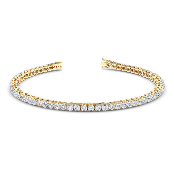 5 carat diamond tennis bracelet in gold.