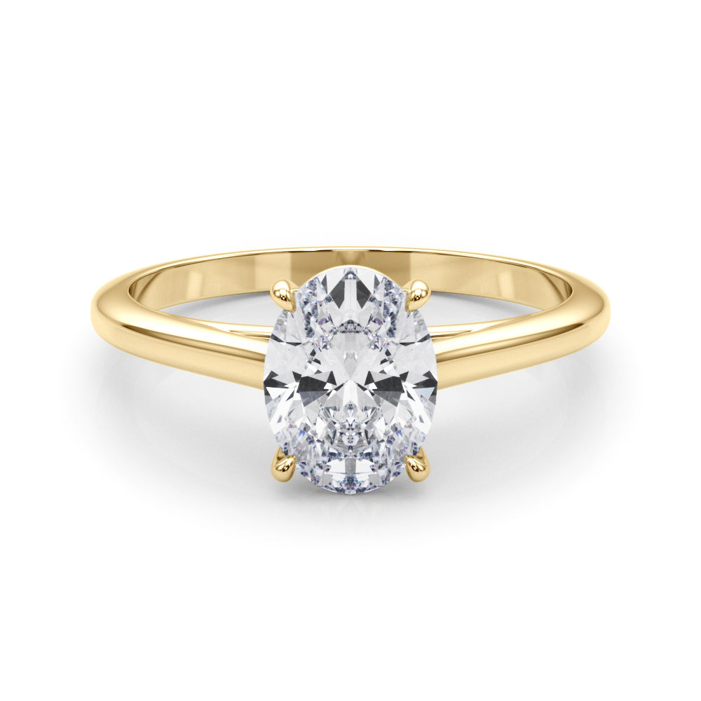 Amber - oval diamond solitaire ring in all gold. Centre oval cut diamond with an elegant gold band in 18ct yellow gold. 