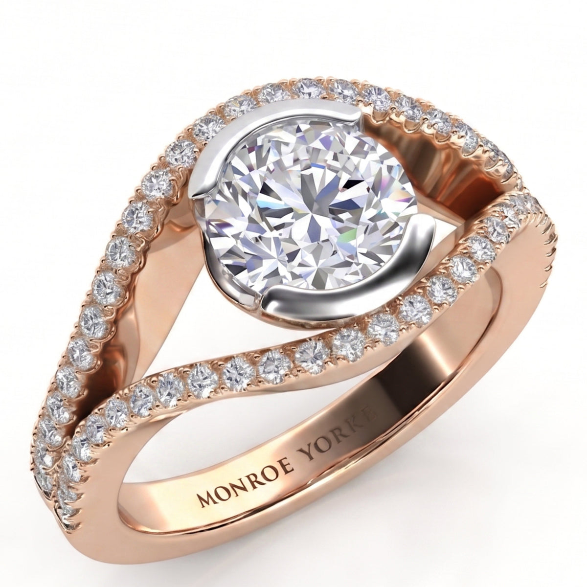 Capri rose gold halo engagement ring, angled view of the round brilliant centre diamond cradled between two diamond set bands that curve around it, Monroe Yorke engraved inside the band.