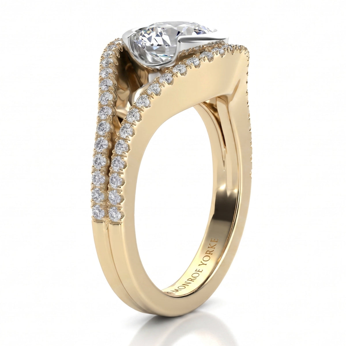 Capri yellow gold engagement ring, close view of the round brilliant centre diamond and the micro claw set diamonds running along both bands.