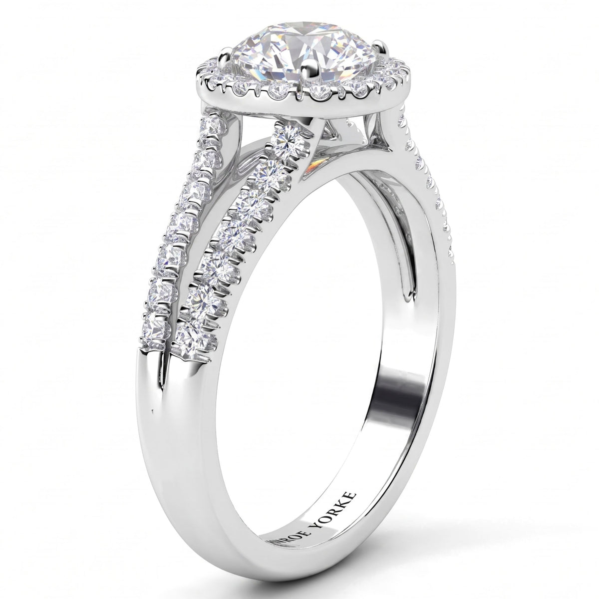Ceduna - diamond engagement ring with a round-cut centre stone, halo setting, and pavé diamond set split band on a clean white background. White Gold or Platinum