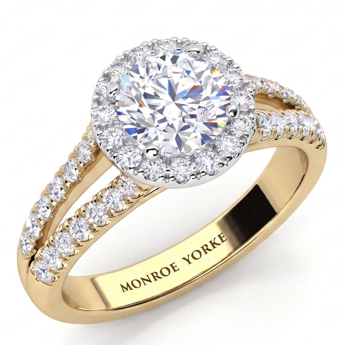 Ceduna yellow gold split band halo engagement ring with a round centre diamond, a diamond halo and a pave set split shank, engraved Monroe Yorke inside the band