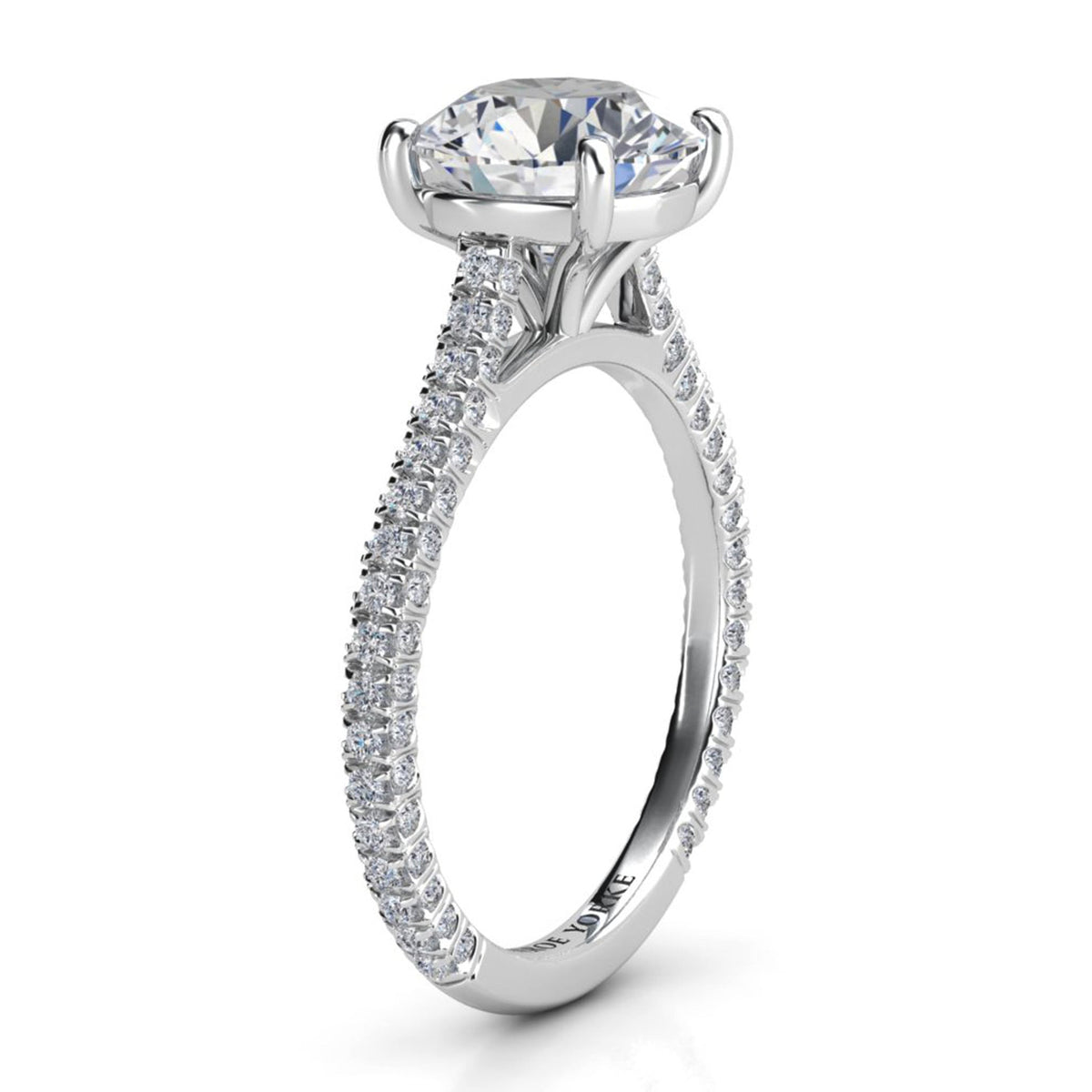 Elsie engagement ring in white gold or platinum. Second side view of the open four claw centre setting.