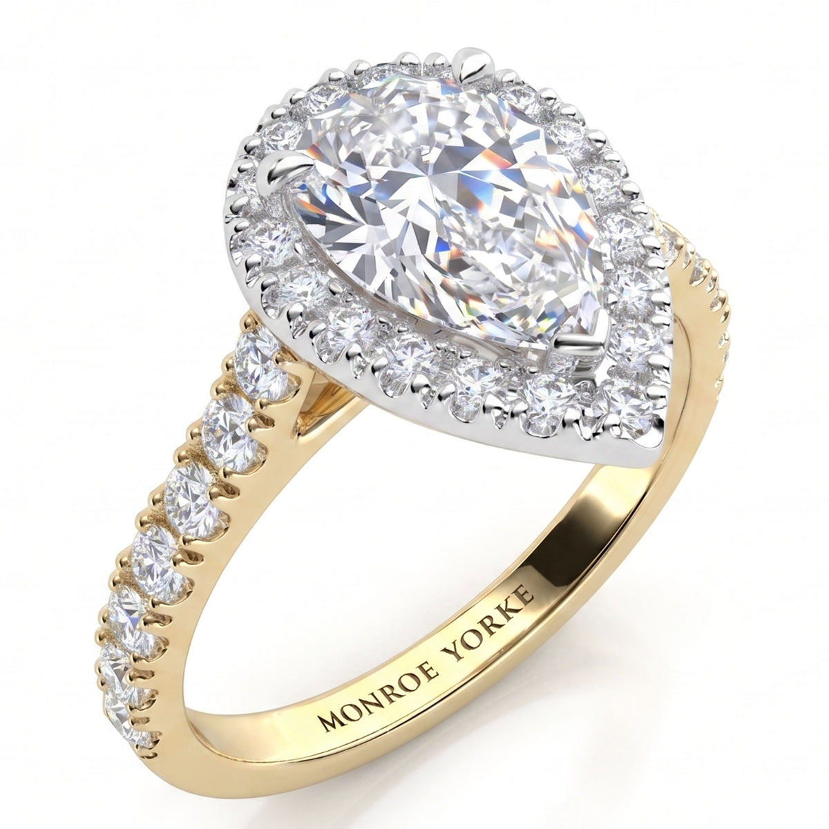 Iris - yellow gold GIA certified pear cut diamond halo engagement ring with diamonds on the sweep up band.