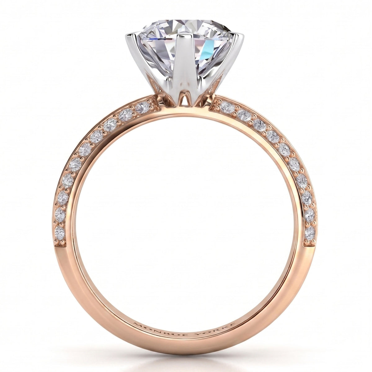 Juliet engagement ring in rose gold. Close view of the six claw centre setting.