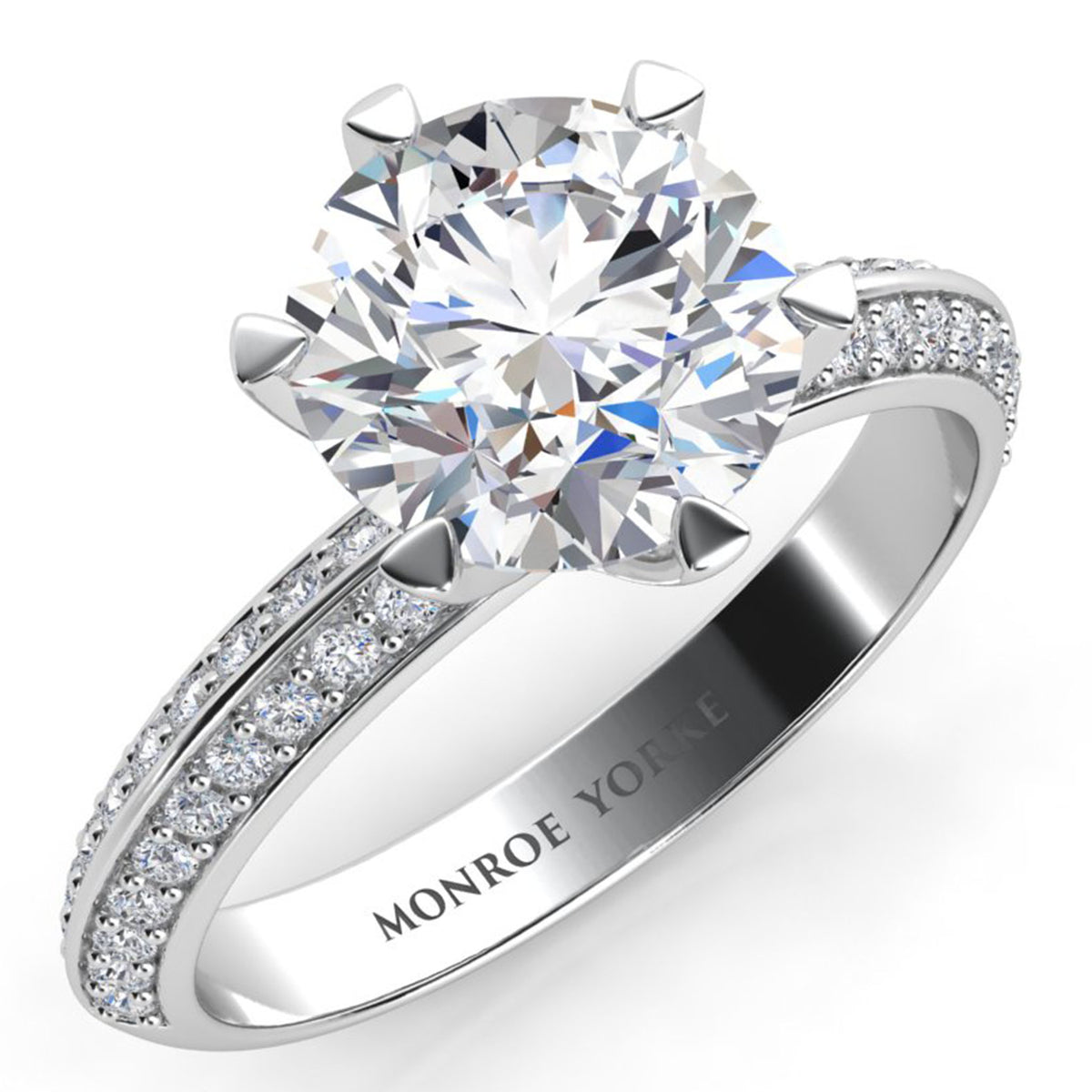 Juliet engagement ring in platinum or white gold. Six claw centre setting with a GIA certified round brilliant diamond, two rows of pave-set diamonds along the knife edge band. Front view.