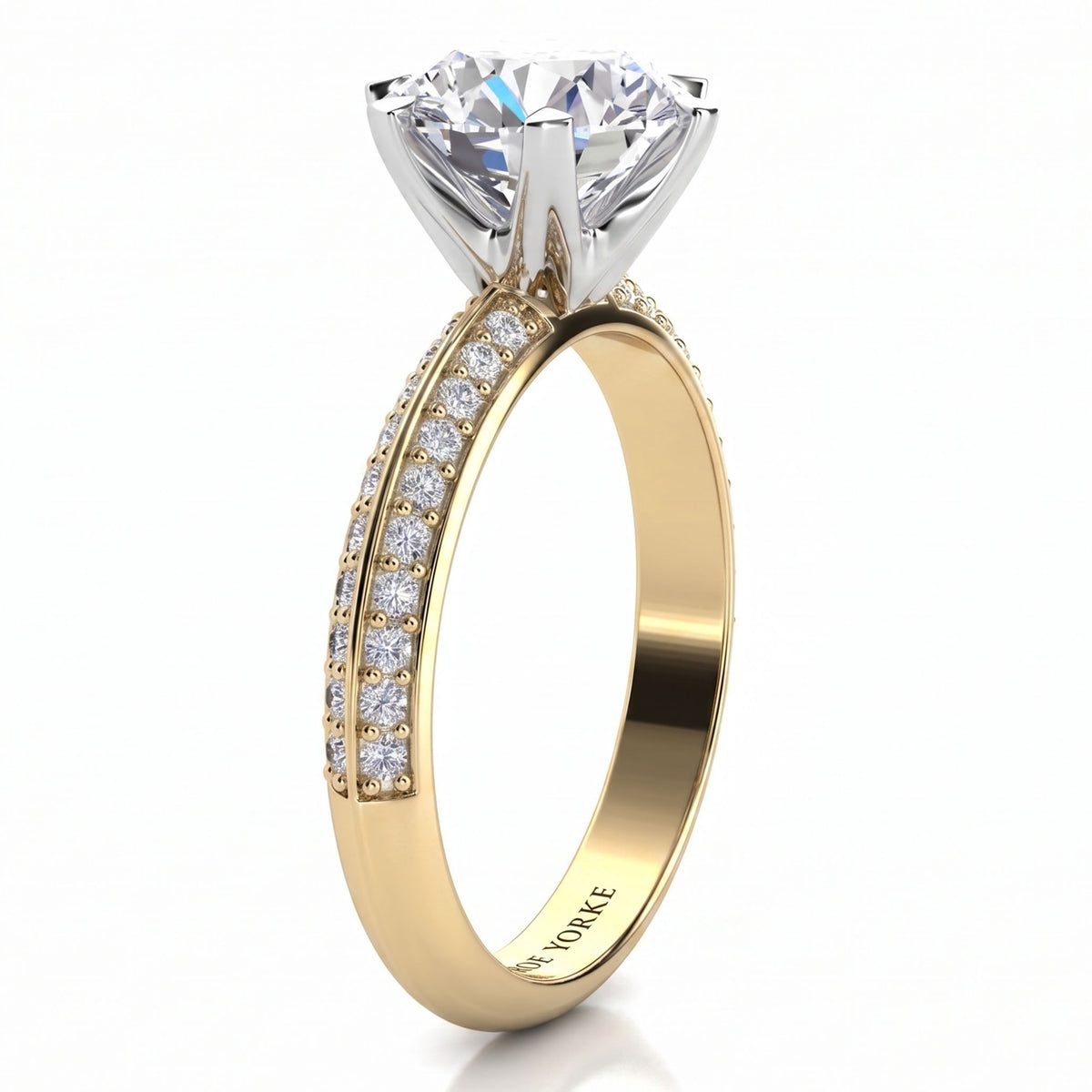 Juliet engagement ring in yellow gold, side view showing the pave-set diamonds along the shank.