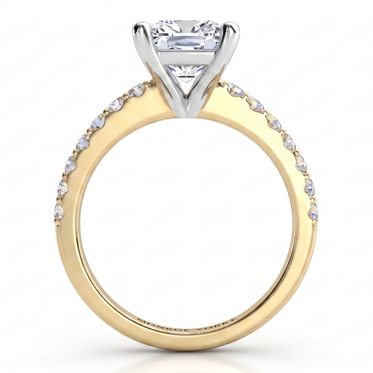 Lutèce yellow gold engagement ring, front elevation of the princess cut centre diamond above a diamond set band.