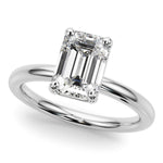 Skye - Emerald Cut Diamond solitaire ring on a white gold or platinum band.  Elegant rounded band. 
