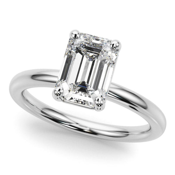 Skye - Emerald Cut Diamond solitaire ring on a white gold or platinum band. Elegant rounded band.