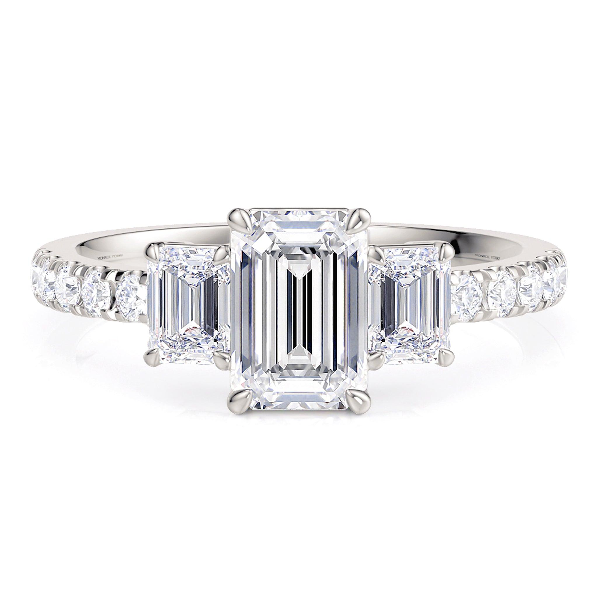 Adele emerald cut three diamond ring in platinum. Diamond trilogy ring in platinum