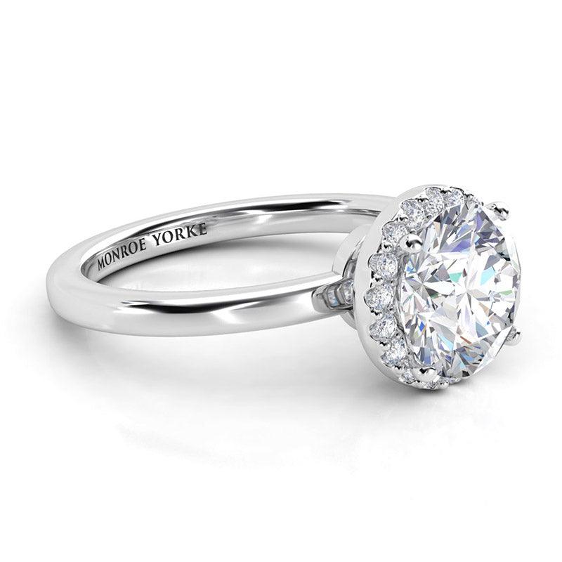Alexa white gold: Side view showing the beautiful centre halo setting — view 3