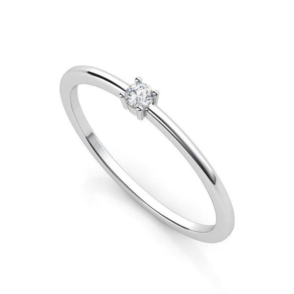Alma single diamond ring from our Petit Collection. White gold or platinum.