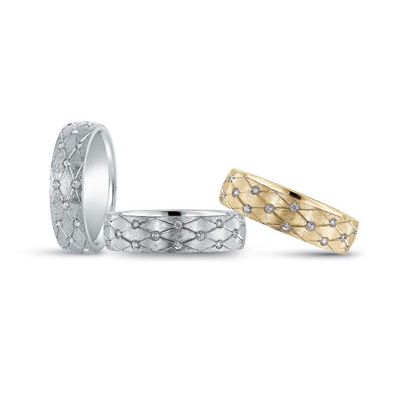 Apollo mens diamond ring. Textured fish with gypsy set diamonds