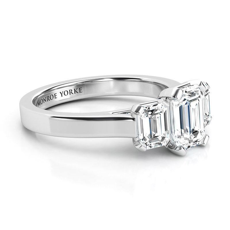 Calista Platinum - emerald cut three stone ring. — view 3