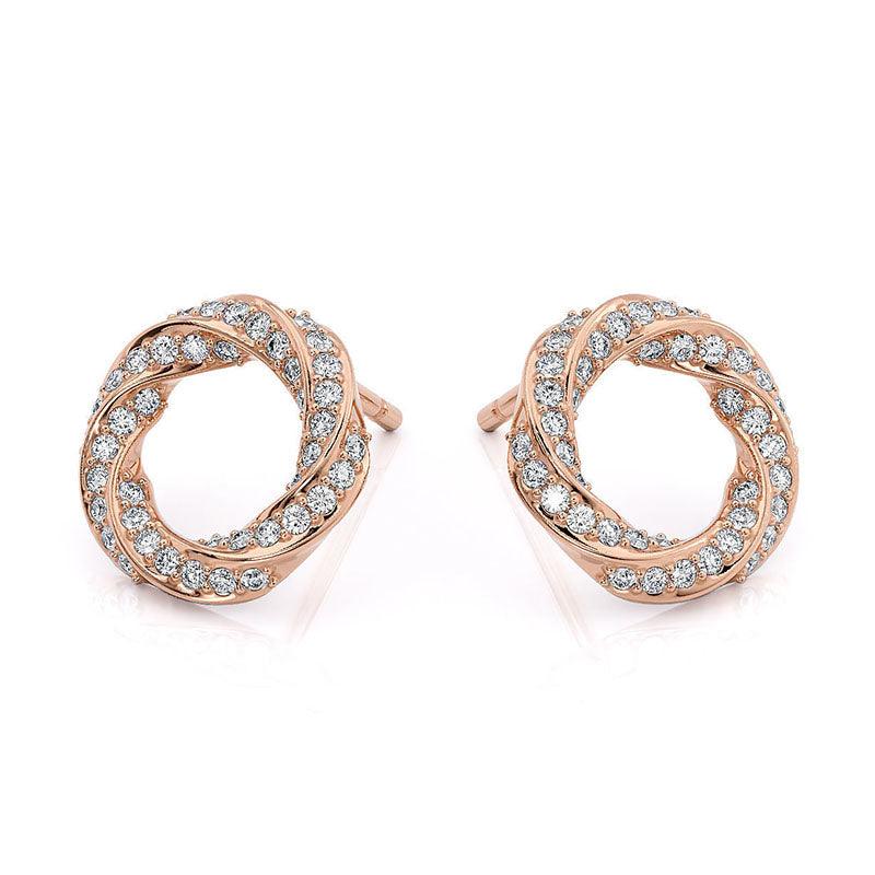 Camila - rose gold diamond earrings. Diamonds pave set into a spiral pattern. Front view