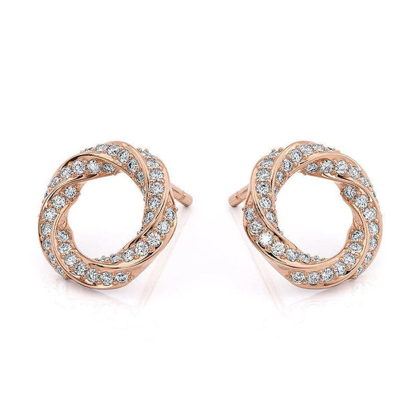 Camila - rose gold diamond earrings. Diamonds pave set into a spiral pattern. Front view