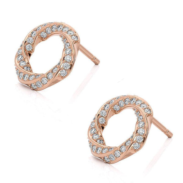 amila - rose gold diamond earrings. Diamonds pave set into a spiral pattern. side view