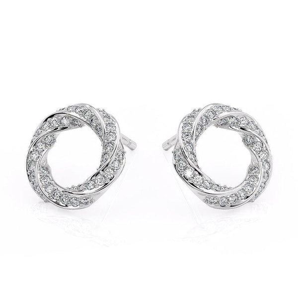 Camila - white gold diamond spiral earrings. Diamonds pave set into a spiral pattern. Front view