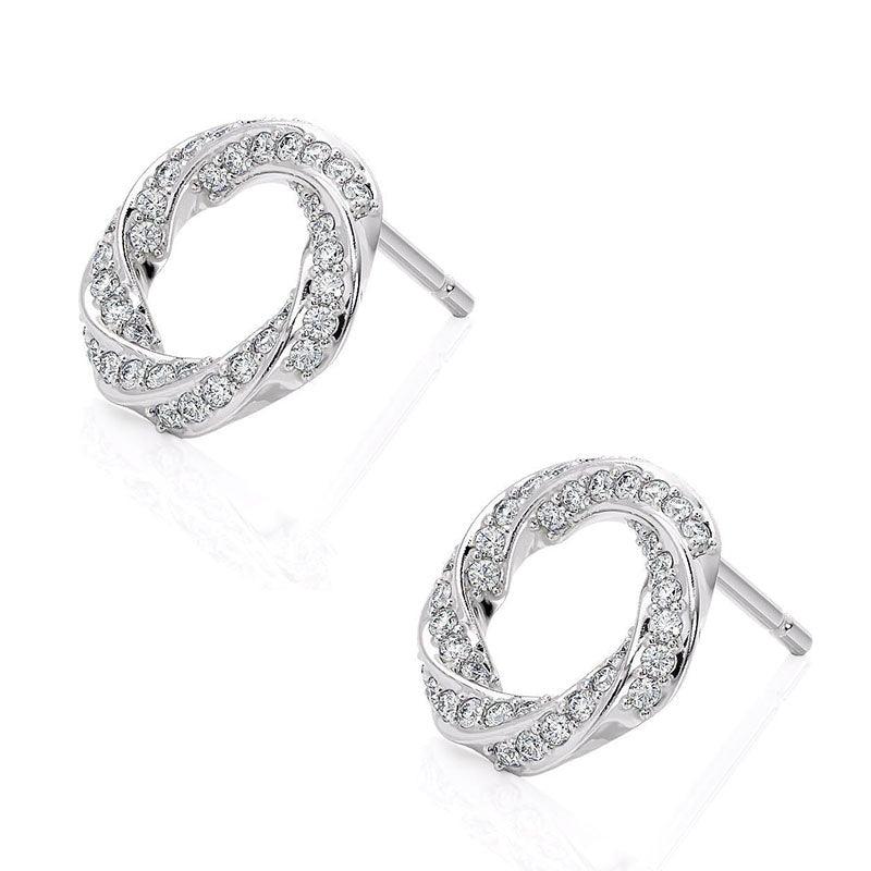 Camila - white gold diamond spiral earrings. Diamonds pave set into a spiral pattern. Side view