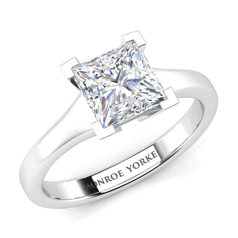 Princess cut solitaire diamond ring with a tapered band and centre v-claw setting. Chester in platinum — view 2