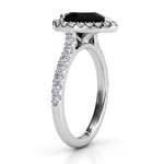 Ciara Platinum - pear halo black diamond  side view showing the beauty of the centre setting and diamonds down the sweep up band.