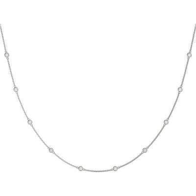 Diamond station necklace in white gold.