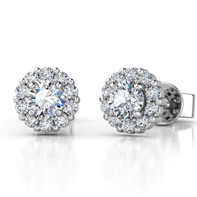 Daisy - round diamond cluster earrings. Centre 0.20ct round diamond and halo of smaller diamonds. Total 0.70 carats, view 1