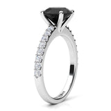 Desir - Black diamond ring in platinum.  Side view showing centre setting. Centre round black diamond 1.70 carats. Centre diamond in a 4 claw setting