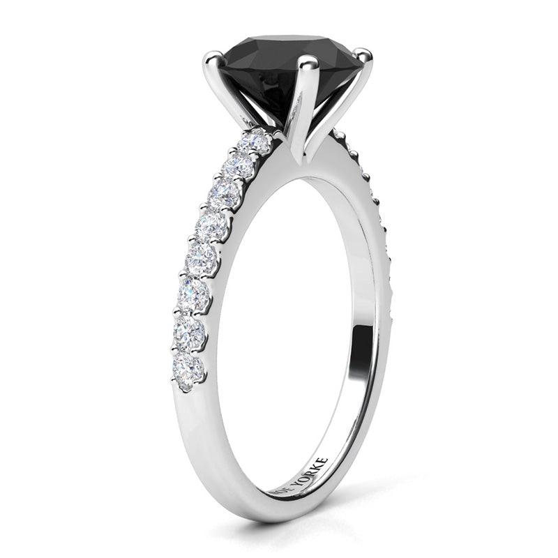 Desir Black Diamond Engagement Ring with white diamonds on the band. White gold or platinum. Side view