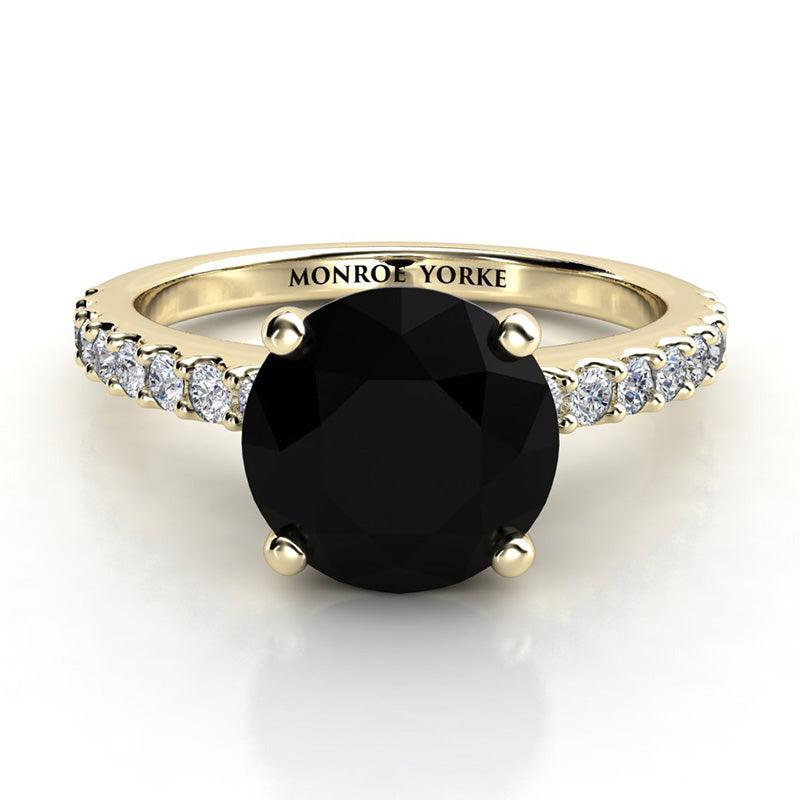 Desir - Gold black diamond ring - Front View. 1.50 carat round black diamond centre . White diamonds down the band.