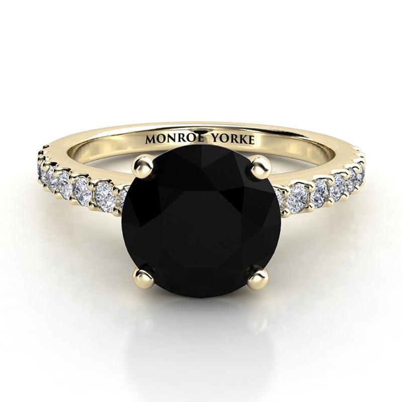 Desir - Gold black diamond ring - Front View. 1.50 carat round black diamond centre . White diamonds down the band.  