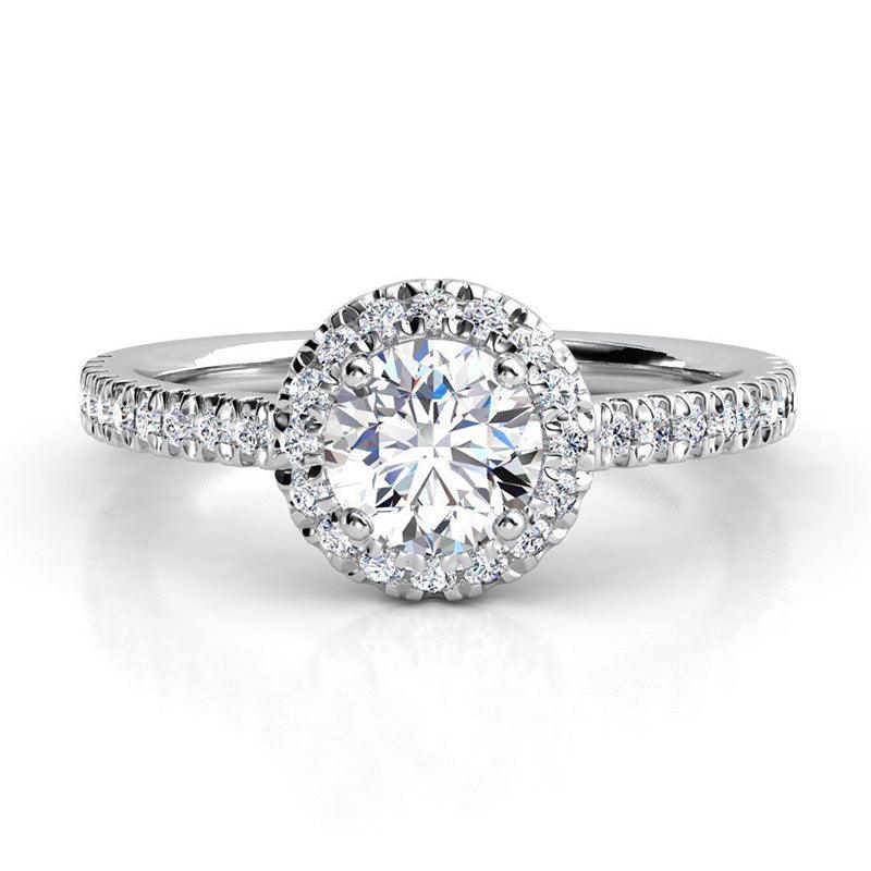 Ecco in platinum - round diamond halo ring with a low centre setting.