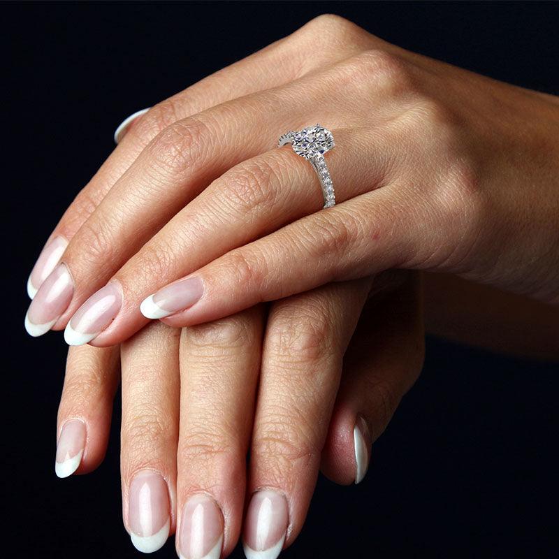 Elodie oval cut diamond engagement ring on hand 2 — view 6