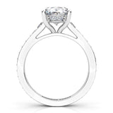 Finley oval shaped diamond engagement ring.  Side view showing the hidden halo of diamonds set to the side of the centre setting. 