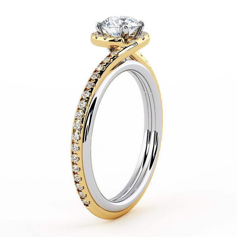 side view of Unique two tone halo diamond engagement ring in yellow and white gold.