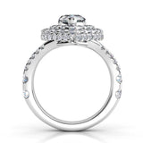 Gilana - Pear cut diamond, double halo ring. Side view, showing the diamonds set to the side of the halo
