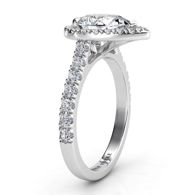 Iris - Platinum GIA certified pear cut diamond halo engagement ring.  Side view showing diamonds on the sweep up band.