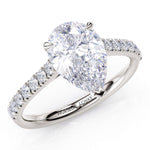 Karly pear cut diamond engagement ring.  Centre 3 claw setting.  Diamonds on the sweep up band. 18ct white gold or platinum.