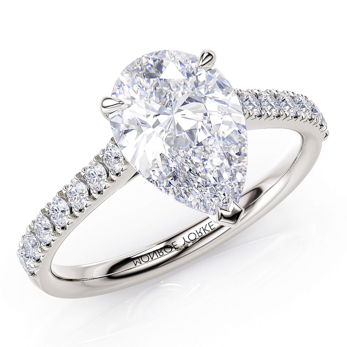 Karly pear cut diamond engagement ring. Centre 3 claw setting. Diamonds on the sweep up band. 18ct white gold or platinum. — view 1
