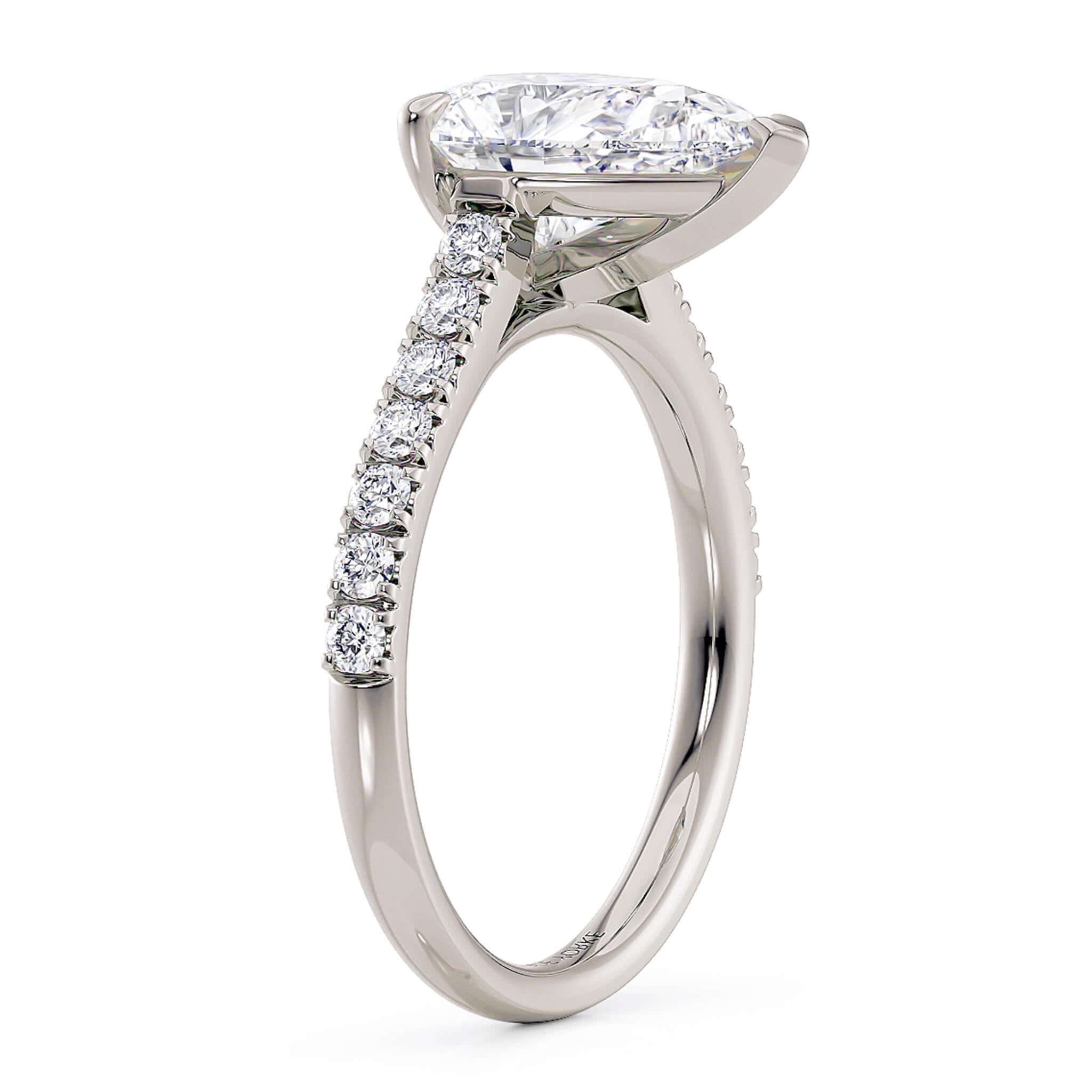 Karly Pear cut diamond engagement ring.  Image showing the elegant centre diamond setting and diamonds on the band.