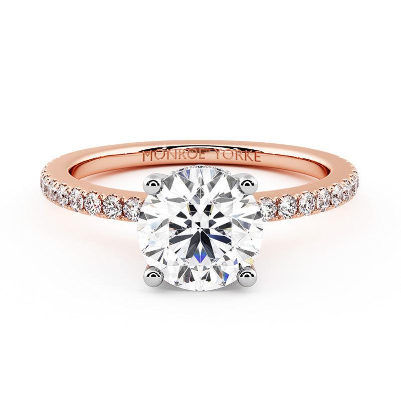 Liliana in Rose Gold - Unique rose gold engagement ring. Hidden halo around the girdle of the main diamond. — view 1