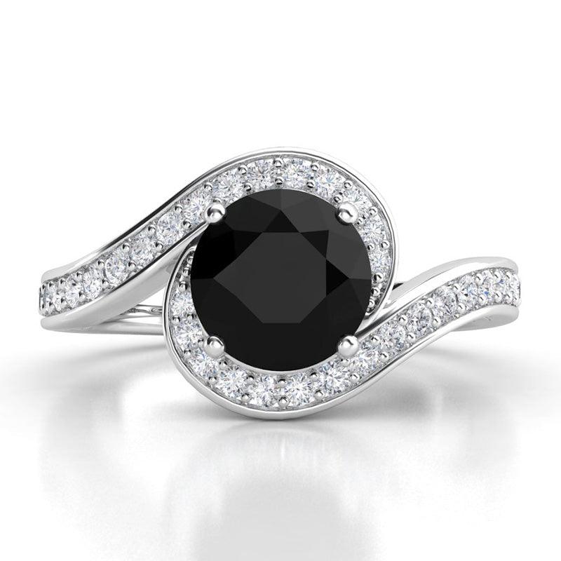 Unique black diamond halo engagement ring in platinum.  White diamond set platinum band wraps the centre black diamond. Miranda