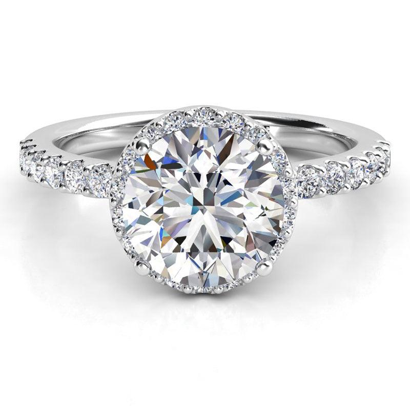 Unique Diamond Ring with Halo set just under main diamond. White Gold. — view 1