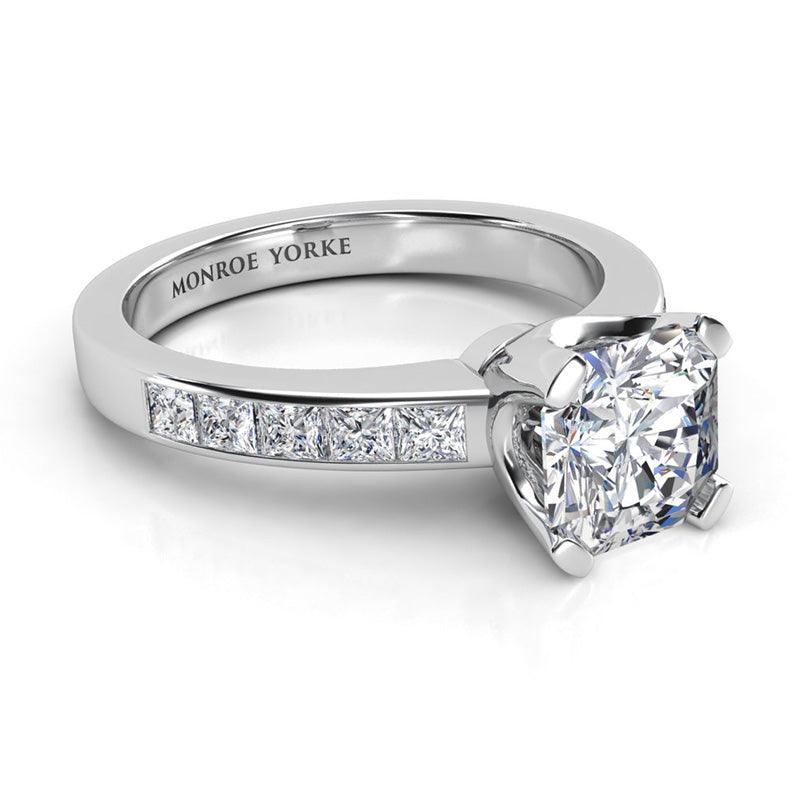 Radiance - radiant cut centre diamond, channel set princess cut diamonds on the band. Side view — view 4