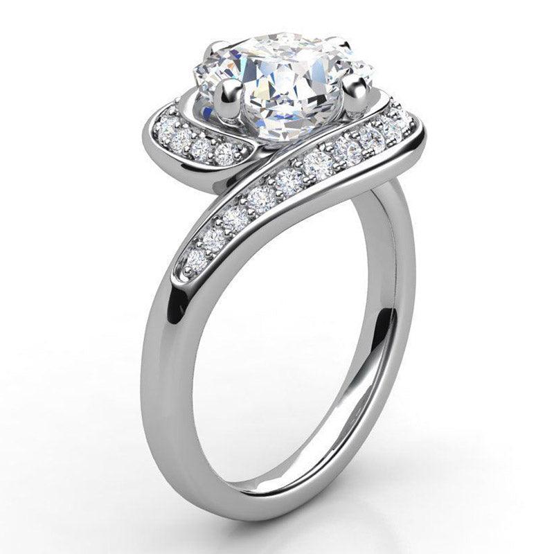 Reese in Platinum - Cushion cut diamond ring. Side view showing the wrap around band — view 2
