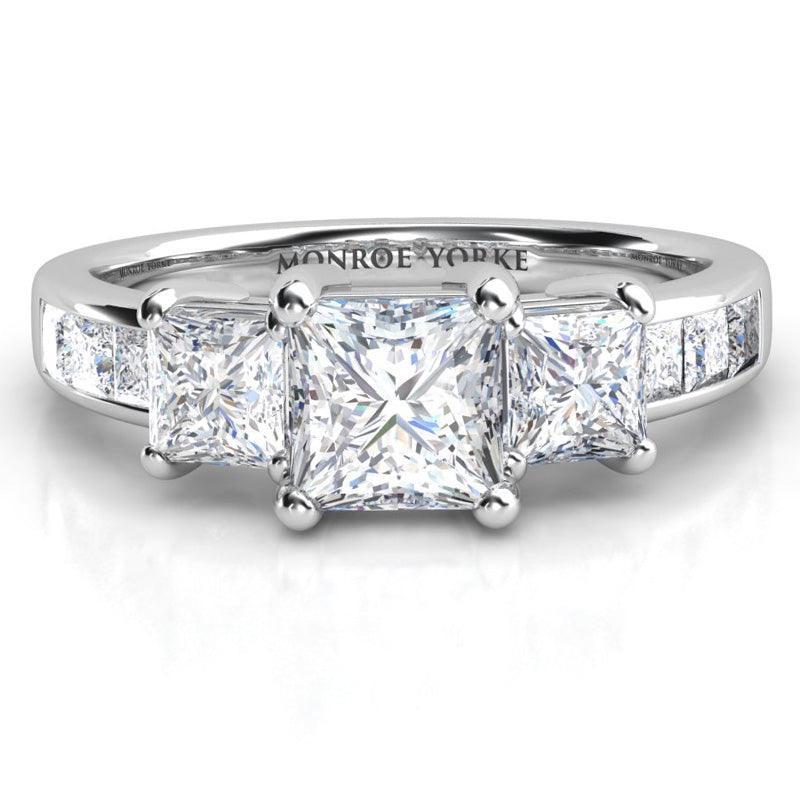 Robina in platinum. Princess / square cut diamond trilogy ring. — view 1