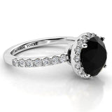 Black diamond ring with a unique white Diamond halo. white gold