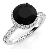 Sasha - Black Diamond Ring with a Unique halo of white diamonds and diamonds down the band. White Gold