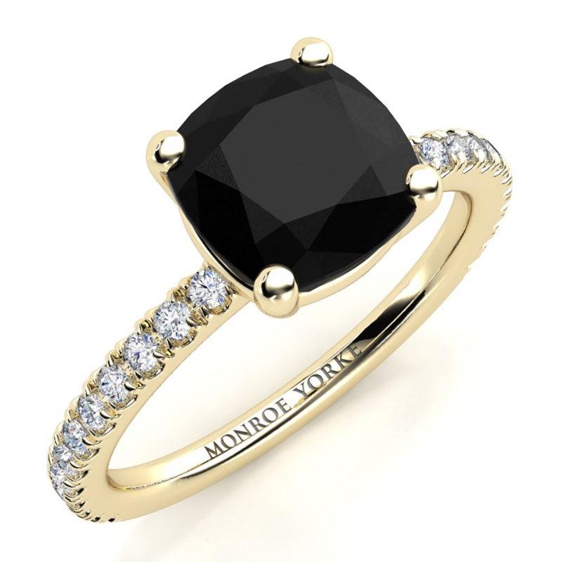 Storm - Gold, cushion cut black diamond ring. Centre basket setting.  Diamond set band